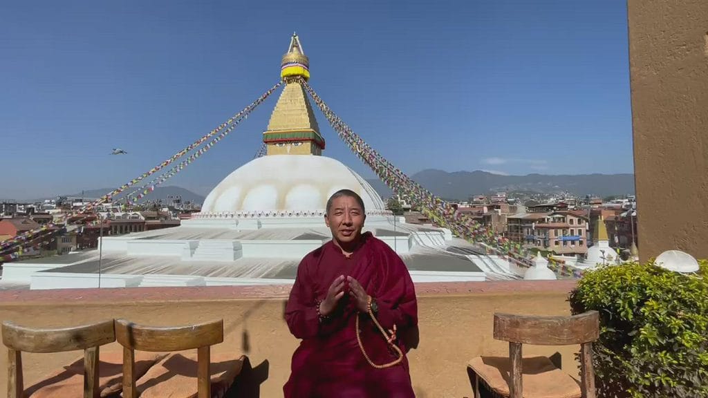 Nepalese Buddhist stand in front of monk during nepal tour