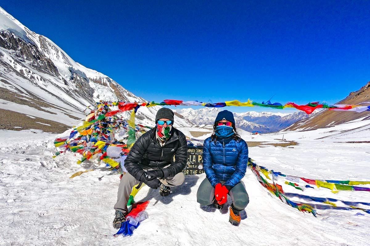 two trekker on mountains